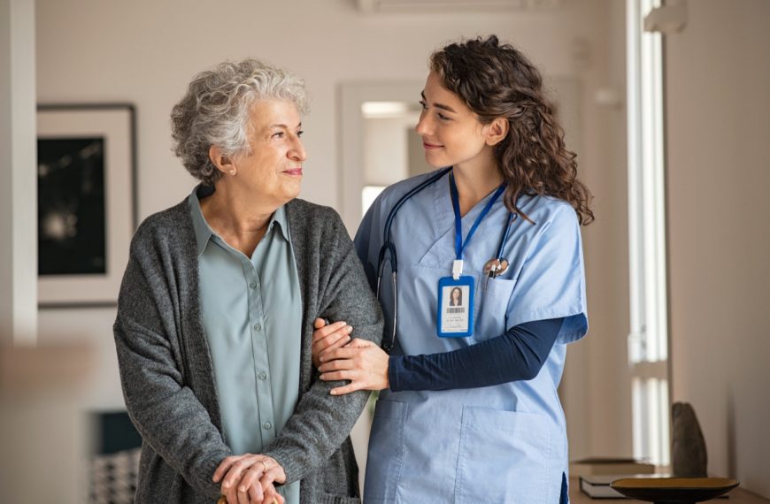 nurse together with an elderly patient